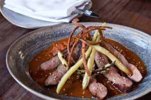 Duck in Mole Coloradito- a Frontera classic updates