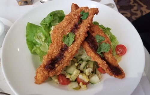 Corn-Fried Louisiana Catfish with tomatillo, grilled corn and salsa over Bibb lettuce